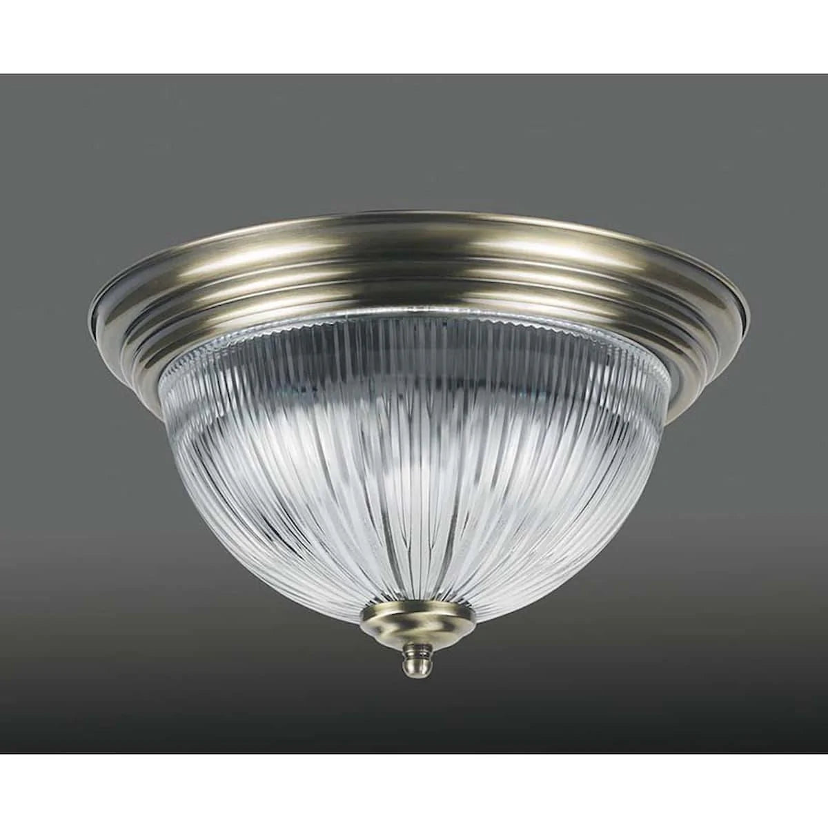 Antique brass semi flush fitting with ribbed glass shade